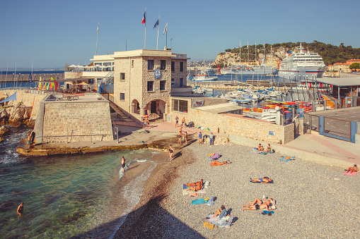 Nice, France - September 26, 2018: People sunbathe on the beach