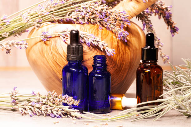 istock lavender mortar and pestle and bottles of essential oils for aromatherapy 1093617744