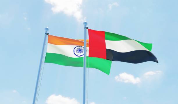 istock UAE and India, two flags waving against blue sky 1093620688