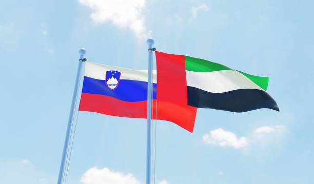 istock UAE and Slovenia, two flags waving against blue sky 1093621758