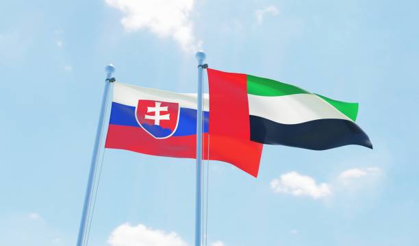 istock UAE and Slovakia, two flags waving against blue sky 1093621762
