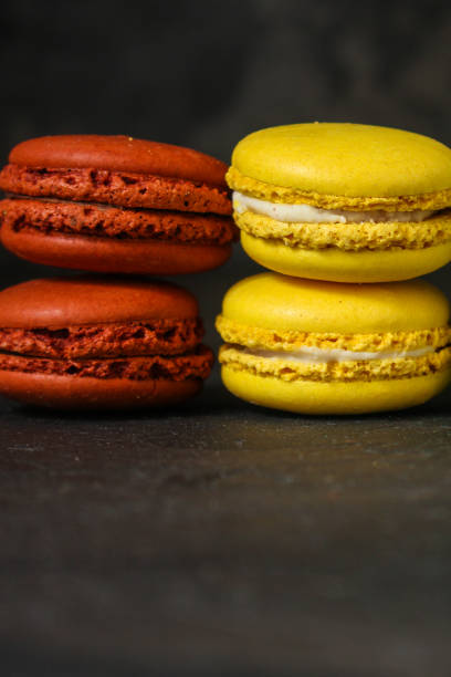istock macaron or macaroon cake, colorful cookies (dark background). copy space 1093621812