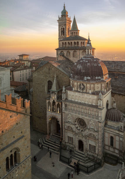 Bergamo, Italy. The old town. Aerial view of the Basilica of Santa Maria Maggiore and the chapel Colleoni during the sunset Bergamo, Italy. The old town. Aerial view of the Basilica of Santa Maria Maggiore and the chapel Colleoni during the sunset bergamo stock pictures, royalty-free photos & images