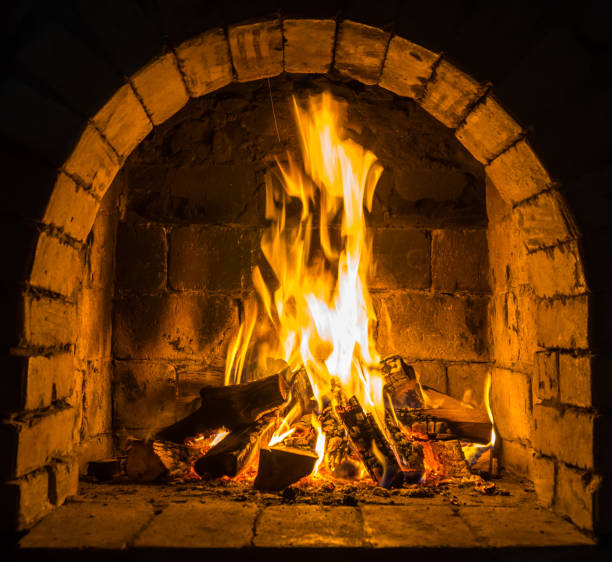 istock Wood burning in a cozy fireplace at home, keep warm 1093627434