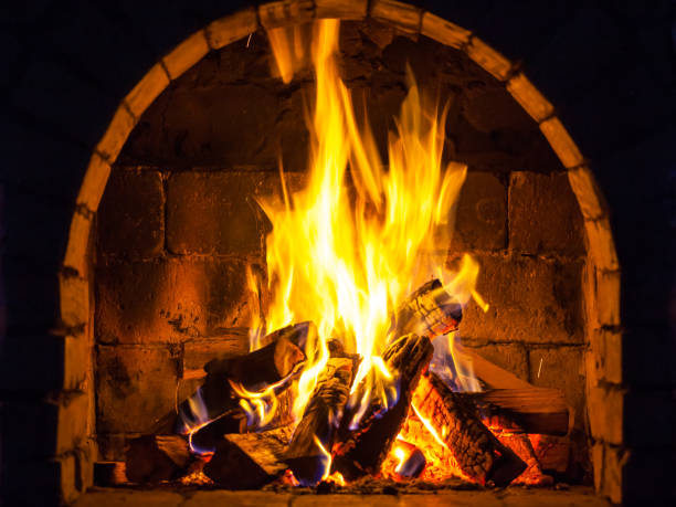 istock Wood burning in a cozy fireplace at home, keep warm 1093627438