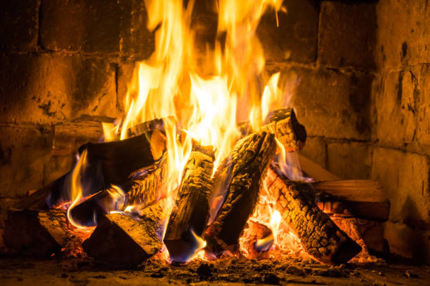 istock Wood burning in a cozy fireplace at home, keep warm 1093627444