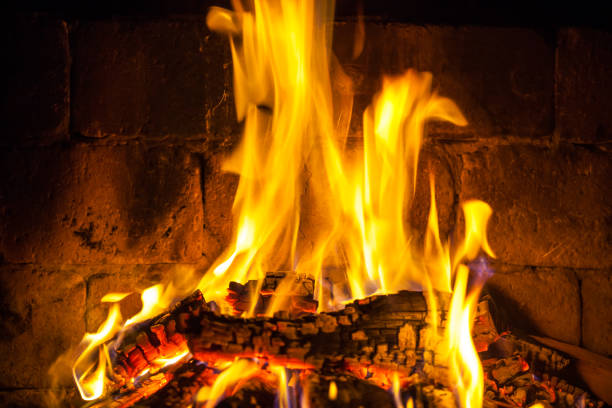 istock Wood burning in a cozy fireplace at home, keep warm 1093627476