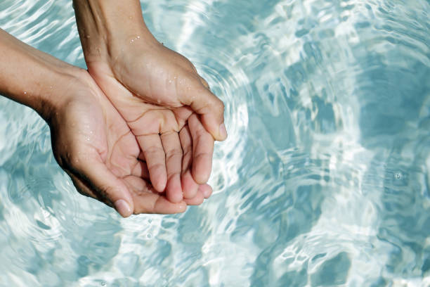 istock Clear water in woman hands 1093627964