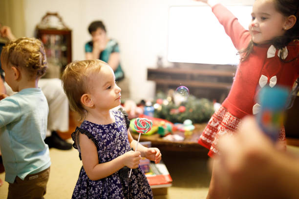 istock Kids playing at Christmas 1093631934