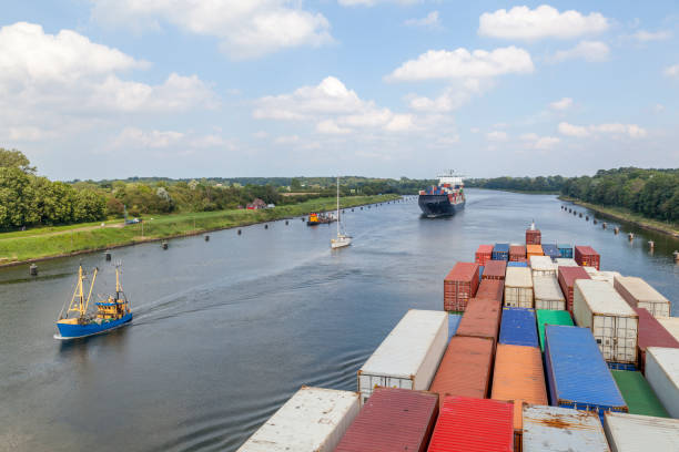 istock Container ship on the Kiel Canal near Kiel, Germany 1093636798