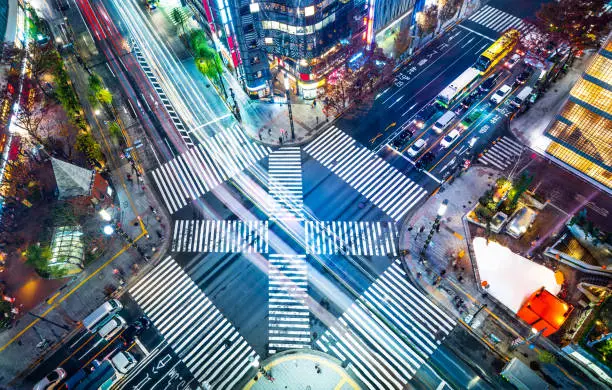 Asia Business concept for real estate and corporate construction - panoramic urban city aerial night view with crosstown traffic in ginza, tokyo, Japan