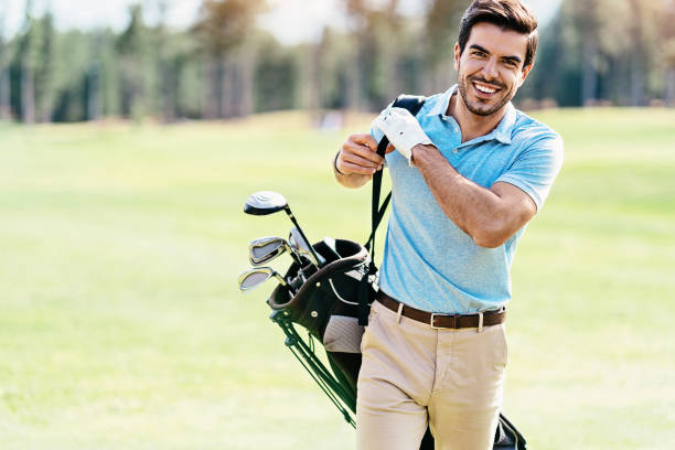 istock Golfer carrying his bag on the playground 1093644958