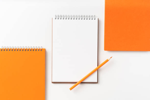 istock Top view of 3 spiral notebook, page, pencil 1093650724