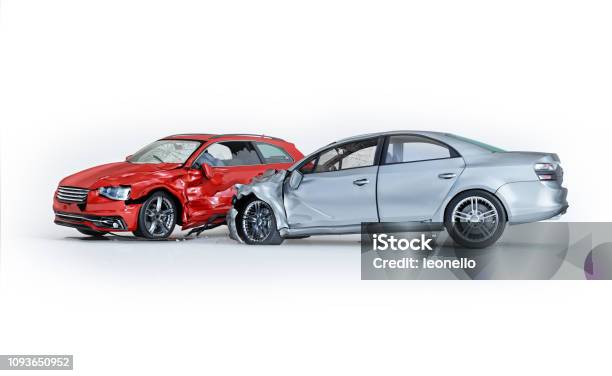 Two Cars Accident Crashed Cars One Silver Sedan Against One Red Coupé Stock Photo - Download Image Now