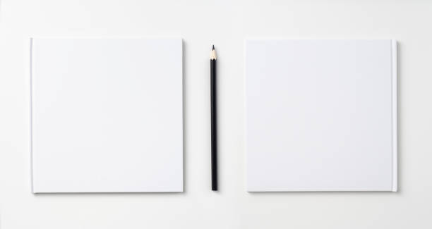 istock Top view of white notebook, page, pencil 1093652562