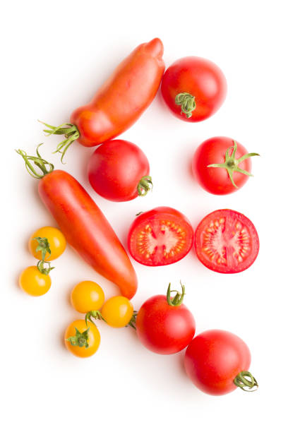 istock Tasty various tomatoes isolated on white background. 1093656014