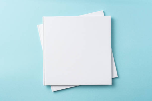 istock Top view of white hardcover notebook on blue 1093658364