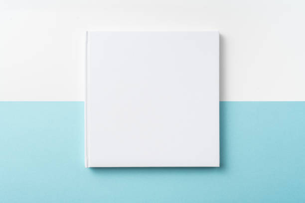 istock Top view of white hardcover notebook on blue 1093658734