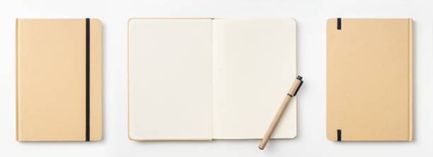 istock Top view of kraft paper notebook, page, pencil 1093659450