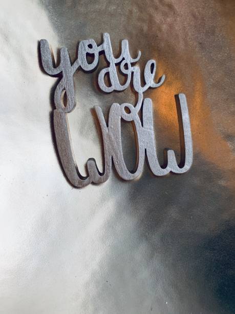 istock You are wow text on golden background 1093667170