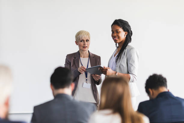 istock Female business presenters 1093670548