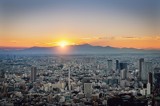 Beautiful view of Tokyo Cityscape at Sunset with Mount Fuji on the Horizon. Downtown Tokyo City, Minato, Honshu, Japan, Asia
