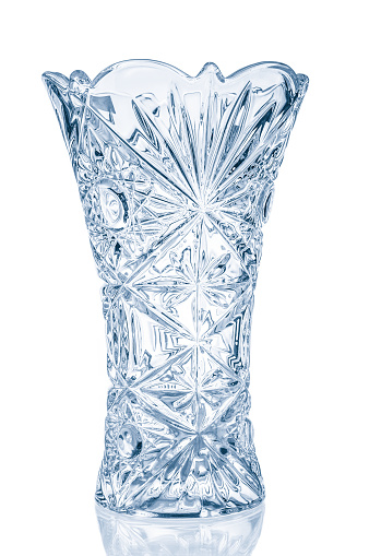 Blue crystal vase close up isolated on white background