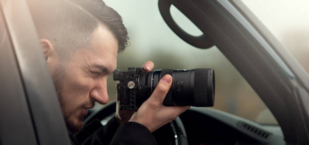 istock Close-up - Young Man Photorapher Sitting In The Car 1093672358