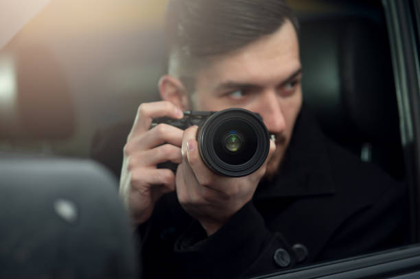 istock Close-up - Young Man Photorapher Sitting In The Car 1093672456