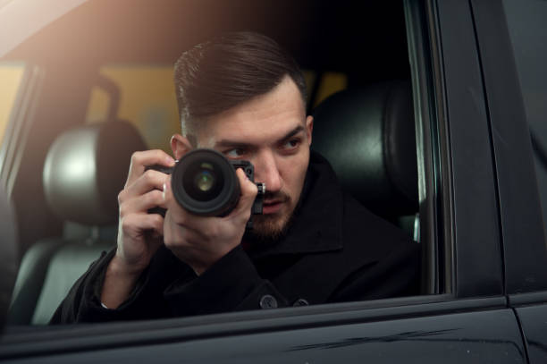 istock Close-up - Young Man Photorapher Sitting In The Car 1093672468