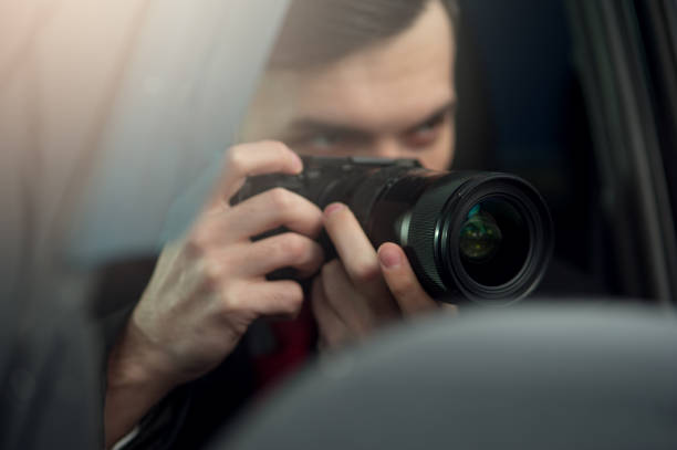 istock Close-up - Young Man Photorapher Sitting In The Car 1093672488