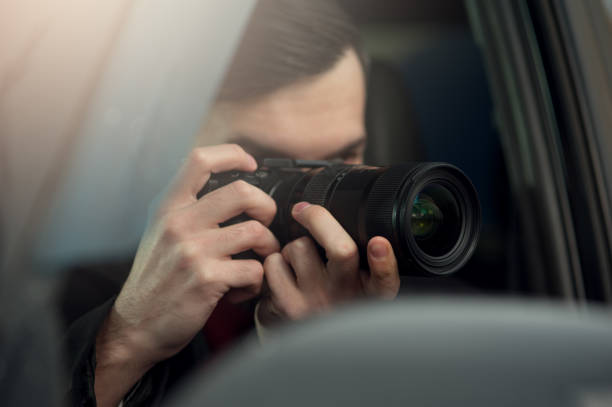 istock Close-up - Young Man Photorapher Sitting In The Car 1093672522
