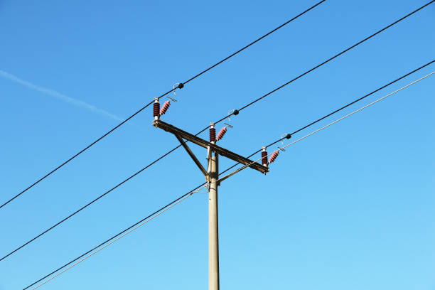 istock Electrical wires over an agricultural field 1093672784