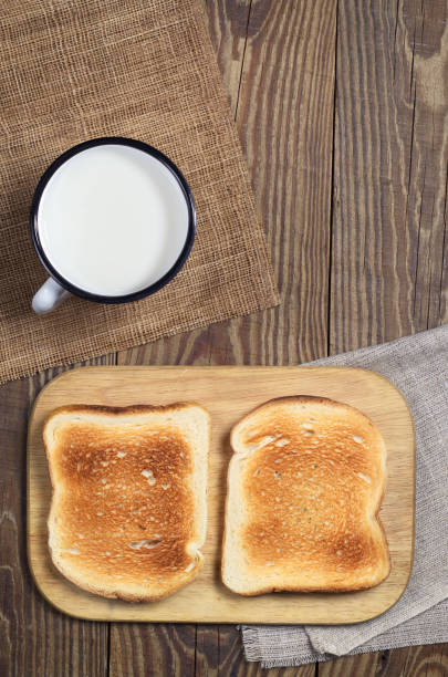 istock Toasted bread and cup of milk 1093674690