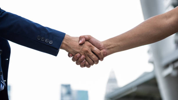 istock Check hand for made an agreement between employer and empoyee 1093675832