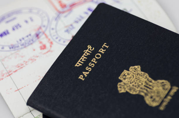 Indian passport New Delhi - December 05 2018: Close up of Indian passport stacked on white background. india airport stock pictures, royalty-free photos & images