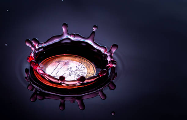 istock water drop impact on a coin 1093682188