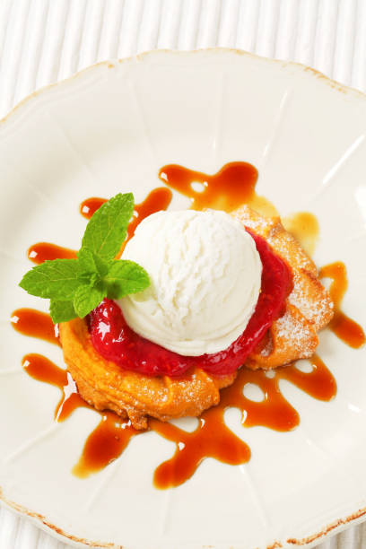 istock Spritz butter cookie with raspberry sauce and ice cream 1093682780
