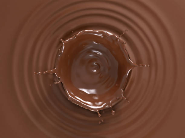 istock Liquid chocolate crown splash. In a liquid chocolate pool. Top view. 1093683502