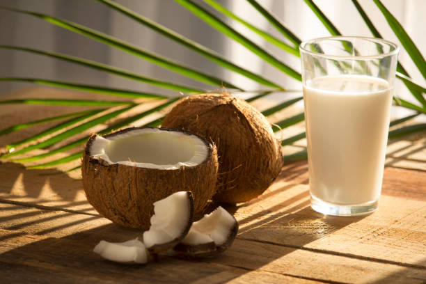 istock Coconut on wooden table 1093683908