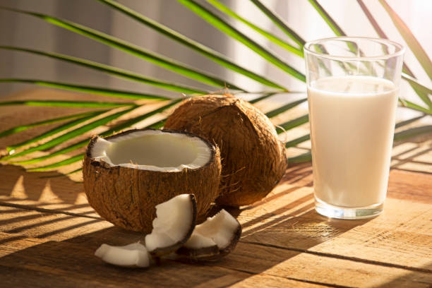 istock Coconut on wooden table 1093683928