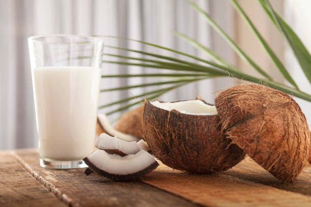 istock Coconut on wooden table 1093685788
