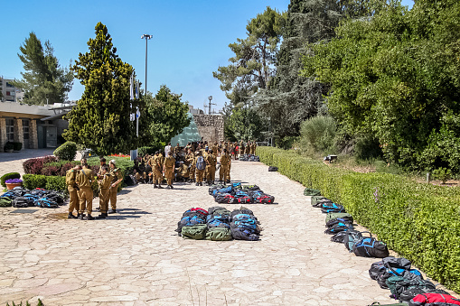 Jerusalem / Israel: June 4, 2017: Group of Israel soldier gather before they set out for military service in Jerusalem, Israel