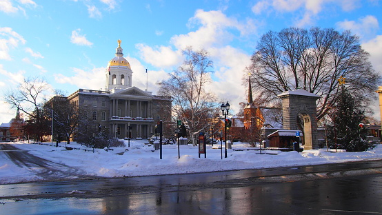 View of the New Hampshire Capitol and its public square decorated for the holidays