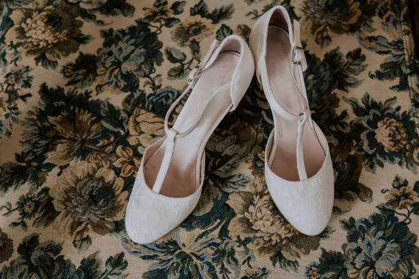 istock wedding shoes on a carpet 1093698188
