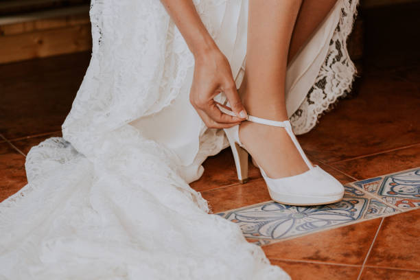 istock bridal detail put on a shoe on a rustic floor 1093698398