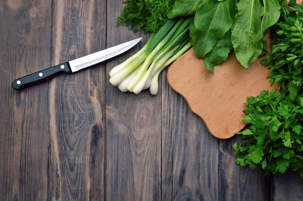 istock Fresh spinach, green onion, basil, herbs, dill .Top view. Toned effect. Food cooking ingredients.  detox concept. 1093698624