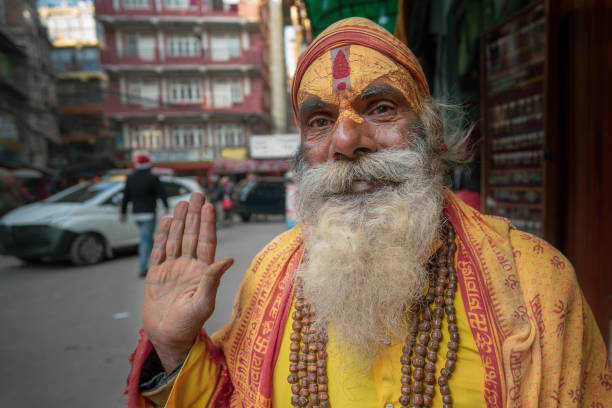 istock Elderly buddhist man on the street Nepal 1093700068