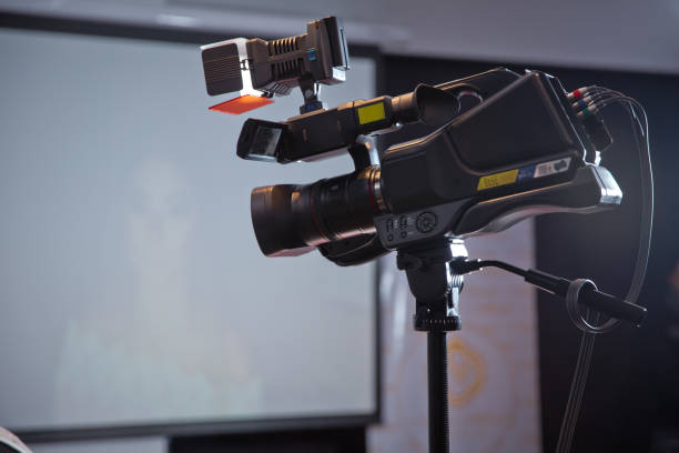 istock Camera recording publicity event . Press conference. Filming an event with a video camera. - Image 1093703520