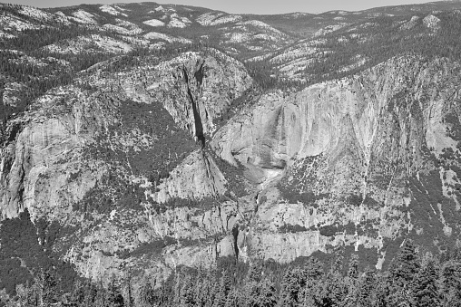 There is no water flowing in the Yosemite Creek at the Upper and Lower Yosemite Falls as seen from Sentinal Dome late in the summer, B&W.